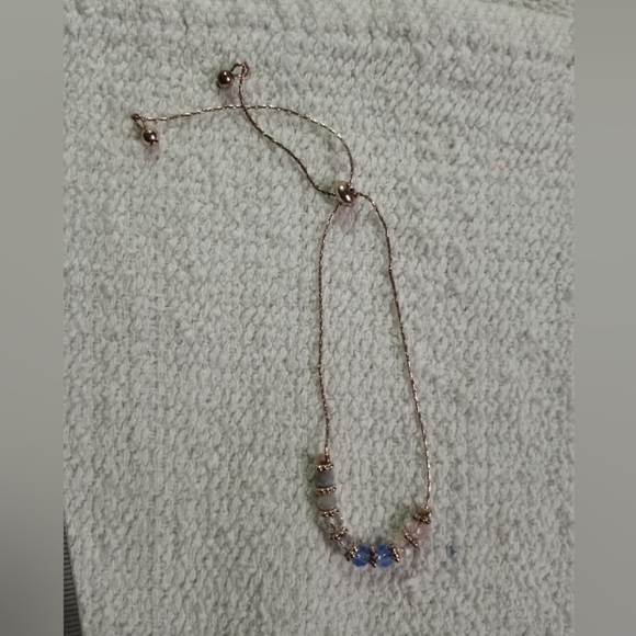 Vintage Jewelry - Petite goldtone adjustable blue beaded bracelet